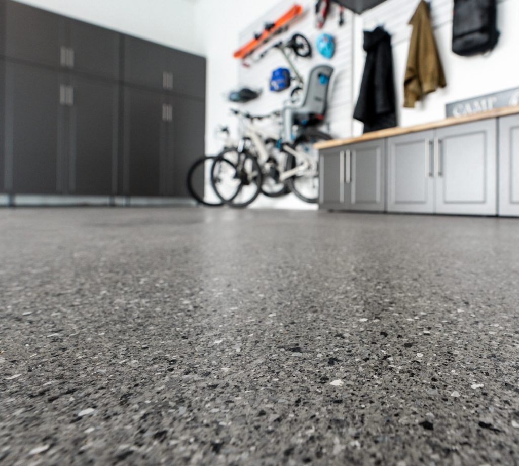 The Hidden Costs of Neglecting Concrete Floor Repairs concrete coating placed down to avoid neglecting concrete floor damage repairs