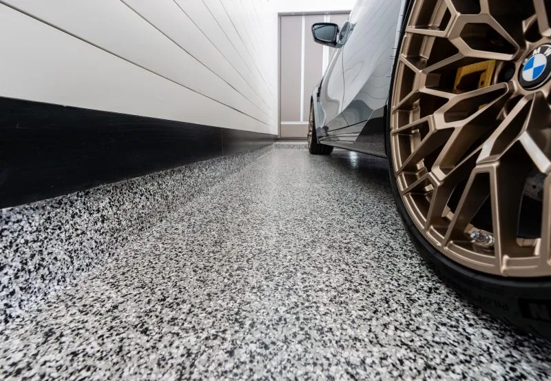 a luxurious garage floor with a specialized coating applied to concrete.