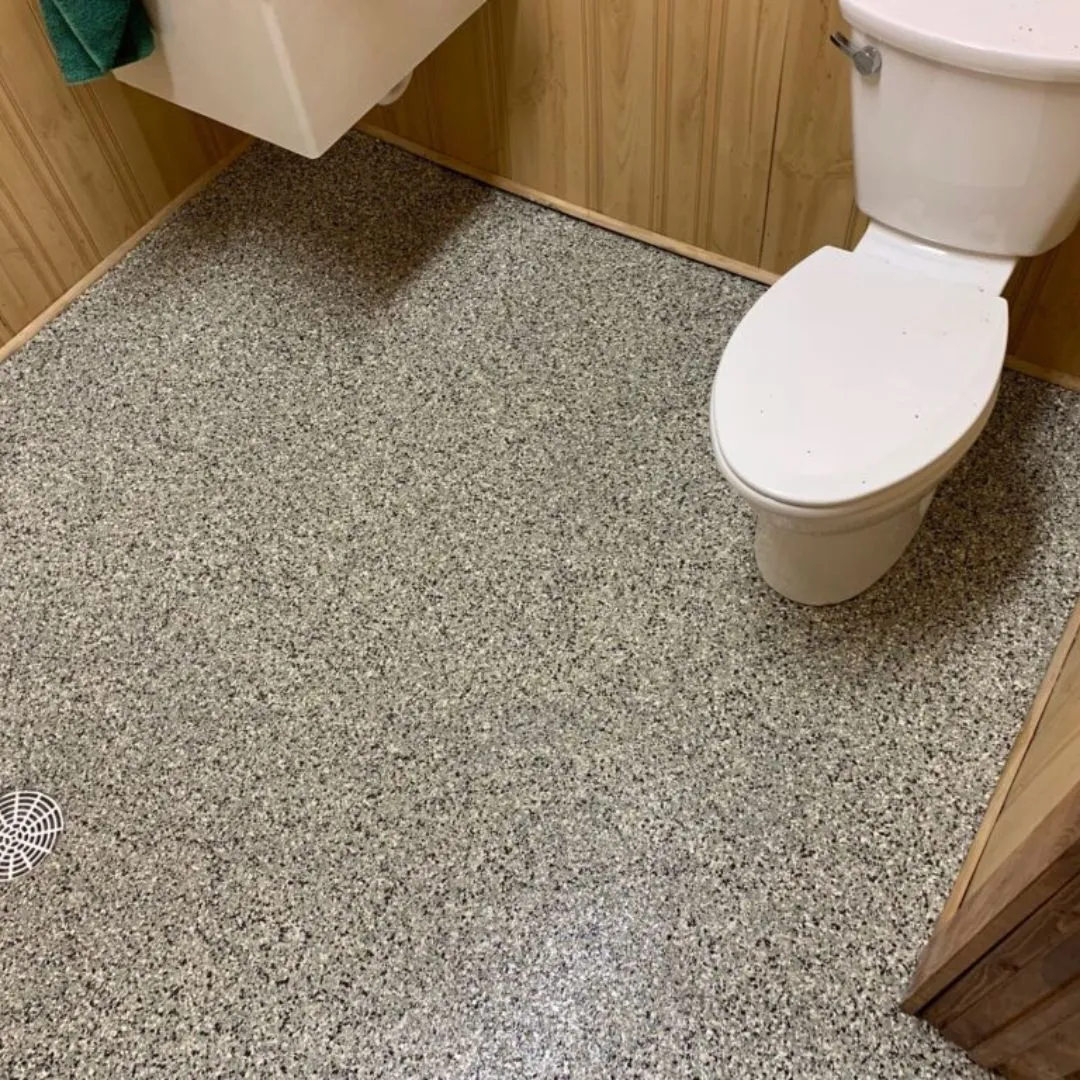 is a decorative flake epoxy bathroom floor coating.