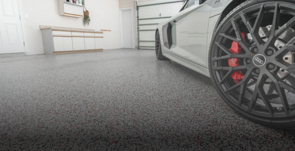 Epoxy garage floor coating with decorative flake finish
