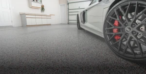 Epoxy garage floor coating with decorative flake finish