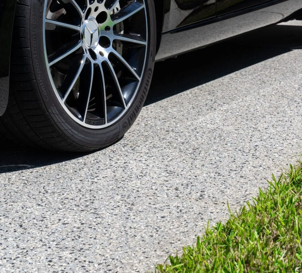 car parked on concrete coating because cement sealer will not stand against the cold and heat