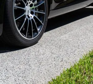 car parked on concrete coating because cement sealer will not stand against the cold and heat