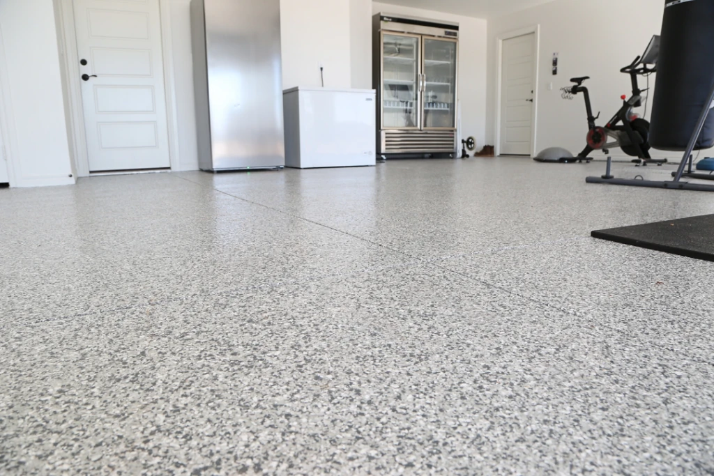 custom floors in a garage by peak concrete coatings