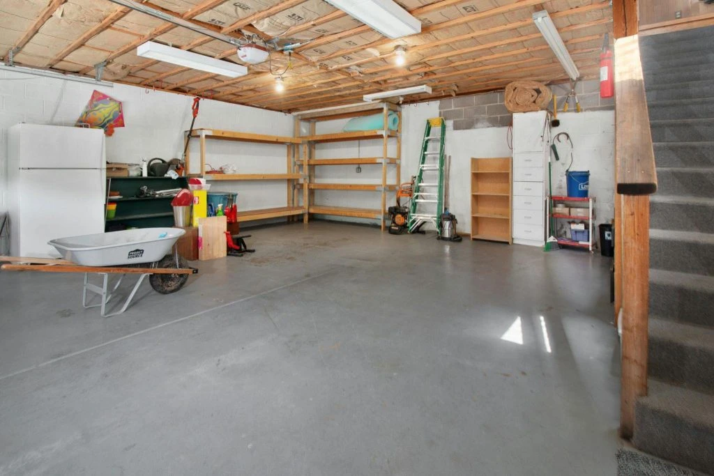 Professional 6-layer chip system garage floor coating in Kansas City by Peak Concrete Coating.